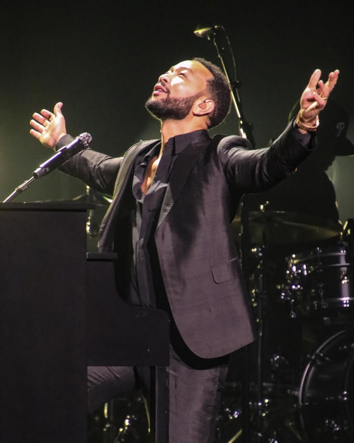 May be an image of microphone, concert and text