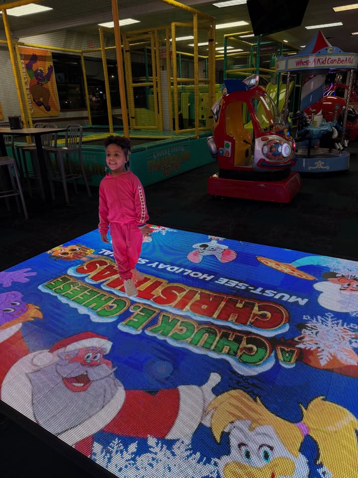 May be an image of child, carousel and text