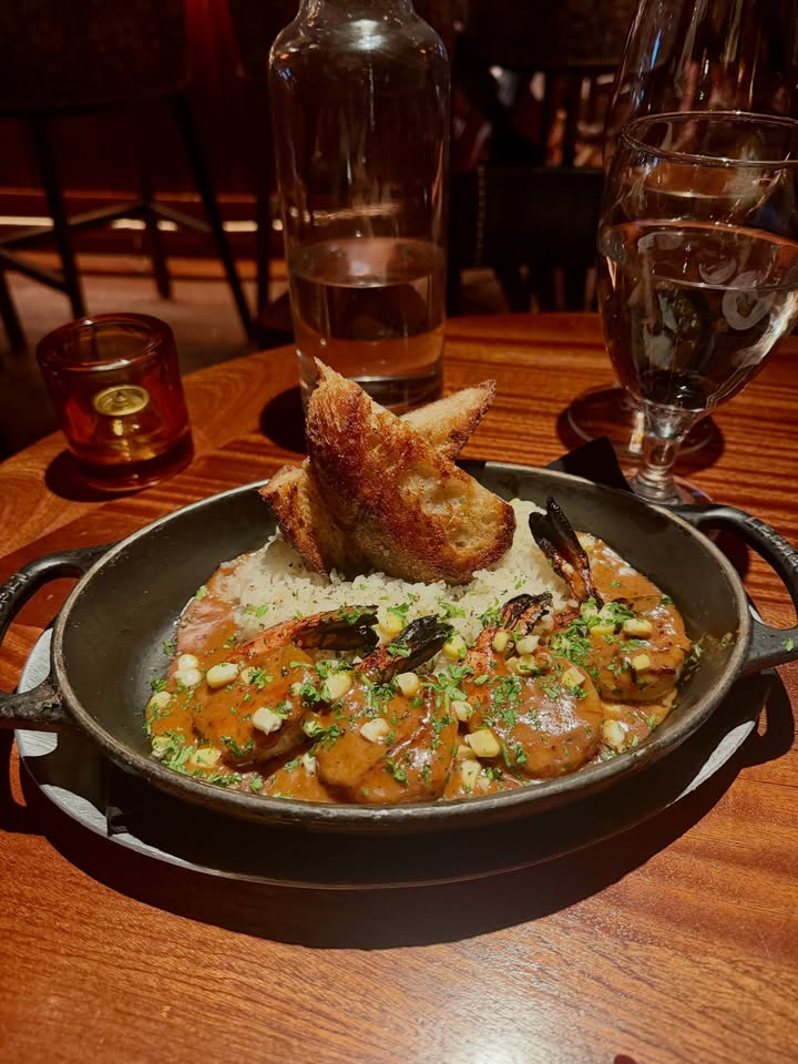 May be an image of baguette, escargot and text