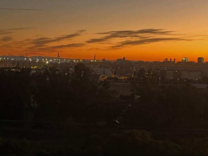 May be an image of twilight, sky and text