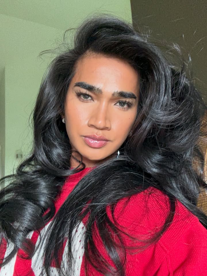 May be a selfie of one or more people, long hair, eyeliner, makeup, people smiling, turtleneck and text