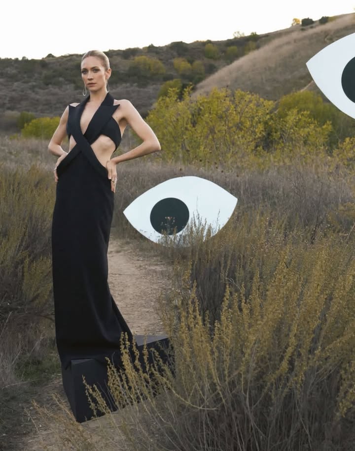 May be an image of one or more people, makeup, jumpsuit, gown, dress and text