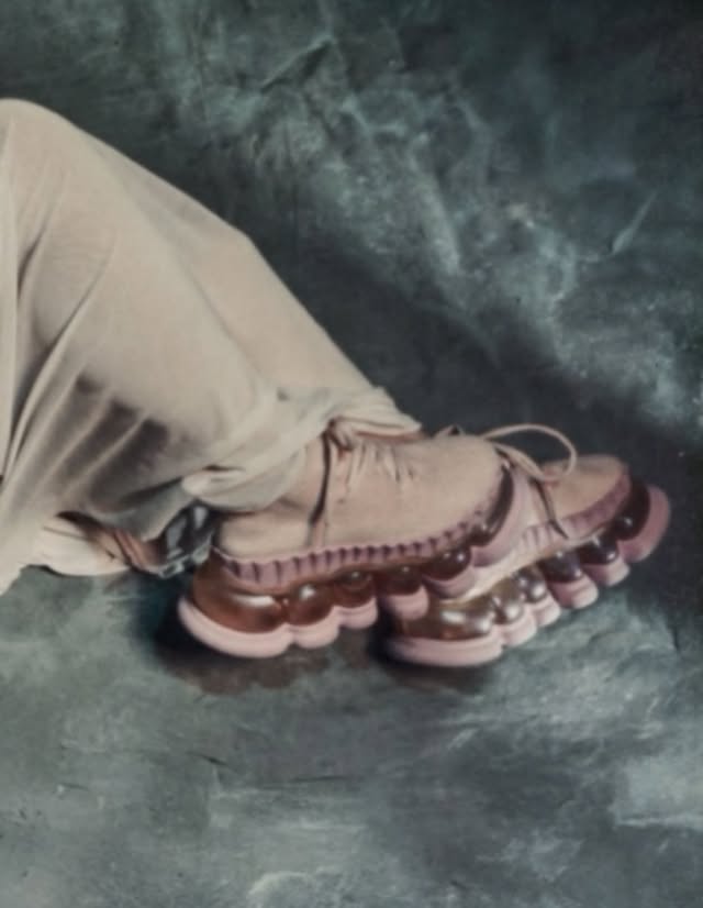 May be an image of sneakers and text