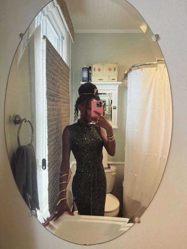 May be an image of mirror and text