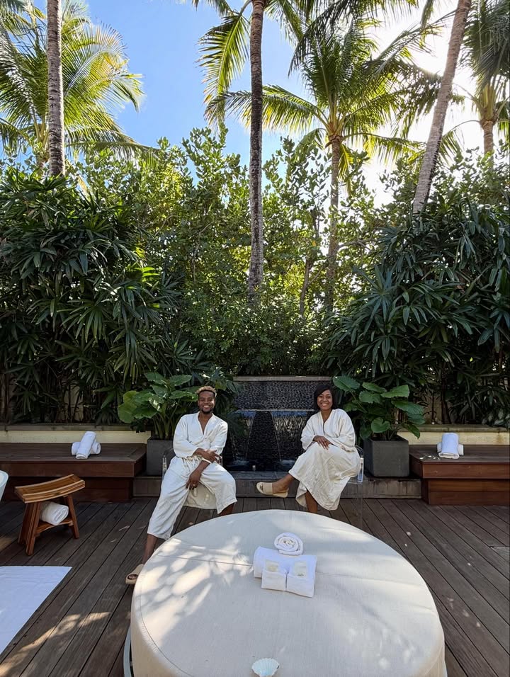 May be an image of deck chair, bath robe, cabana and text