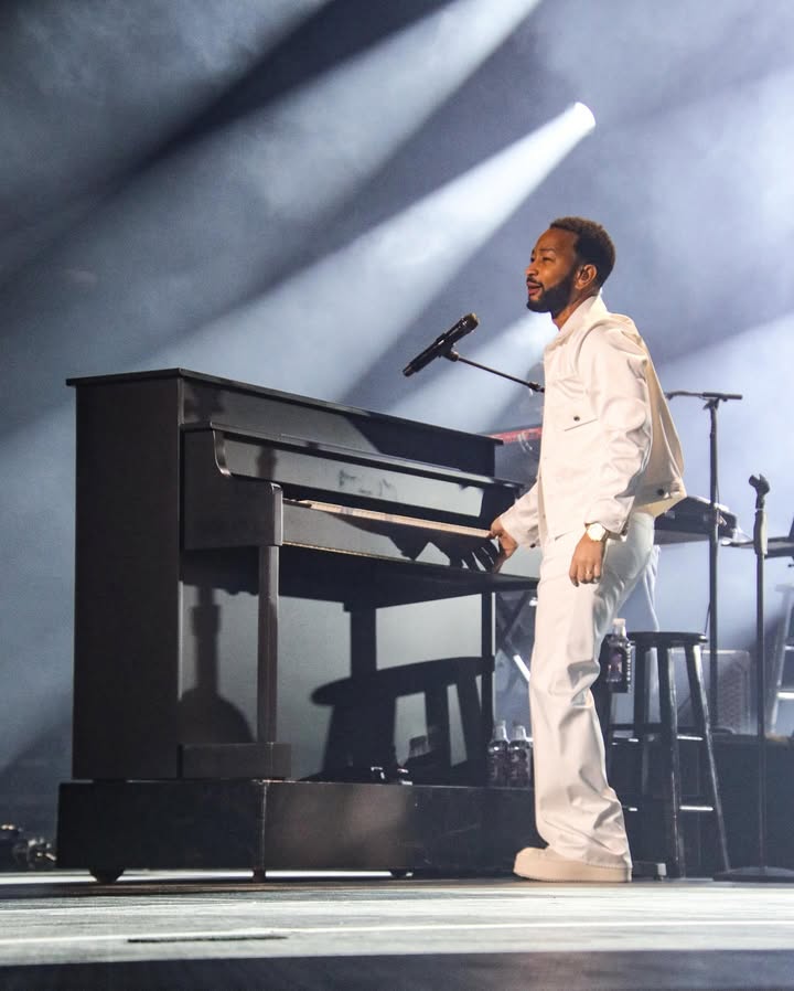 May be an image of piano, microphone, concert and text