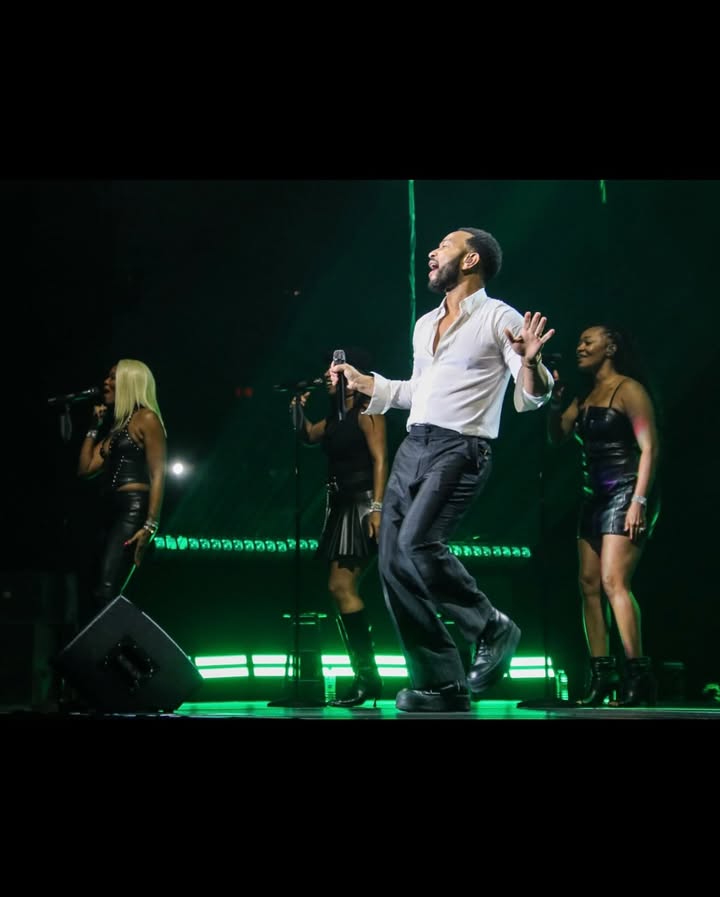 May be an image of dancing, microphone, concert and text