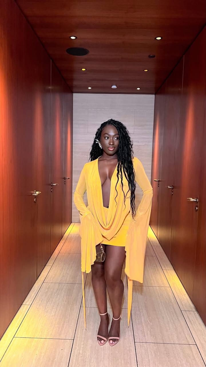 May be an image of one or more people, sundress, dress and text