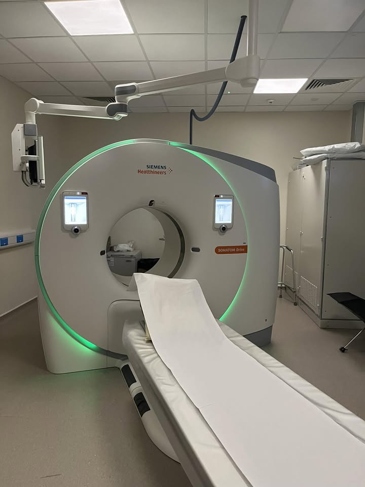 May be an image of hospital and text