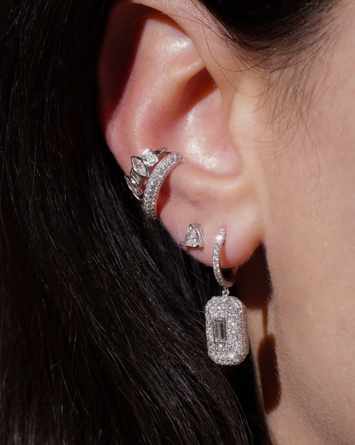 May be an image of jewelry and text