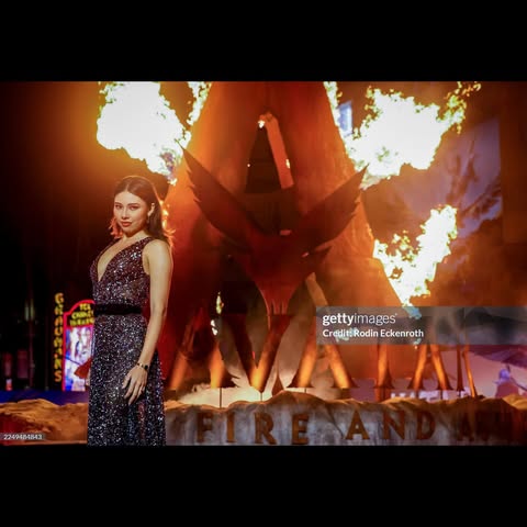 May be a video game screenshot of fire, costume and text that says '2244484843 gettyimages® yi LNA CreditRodin CreditiRodinEckenroth Credit Eckenroth FLRENA LRI MA'