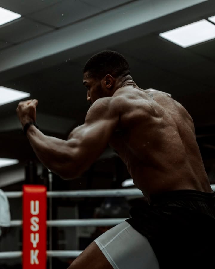 May be an image of one or more people, biceps, people bodybuilding, sportswear, punching bag and text