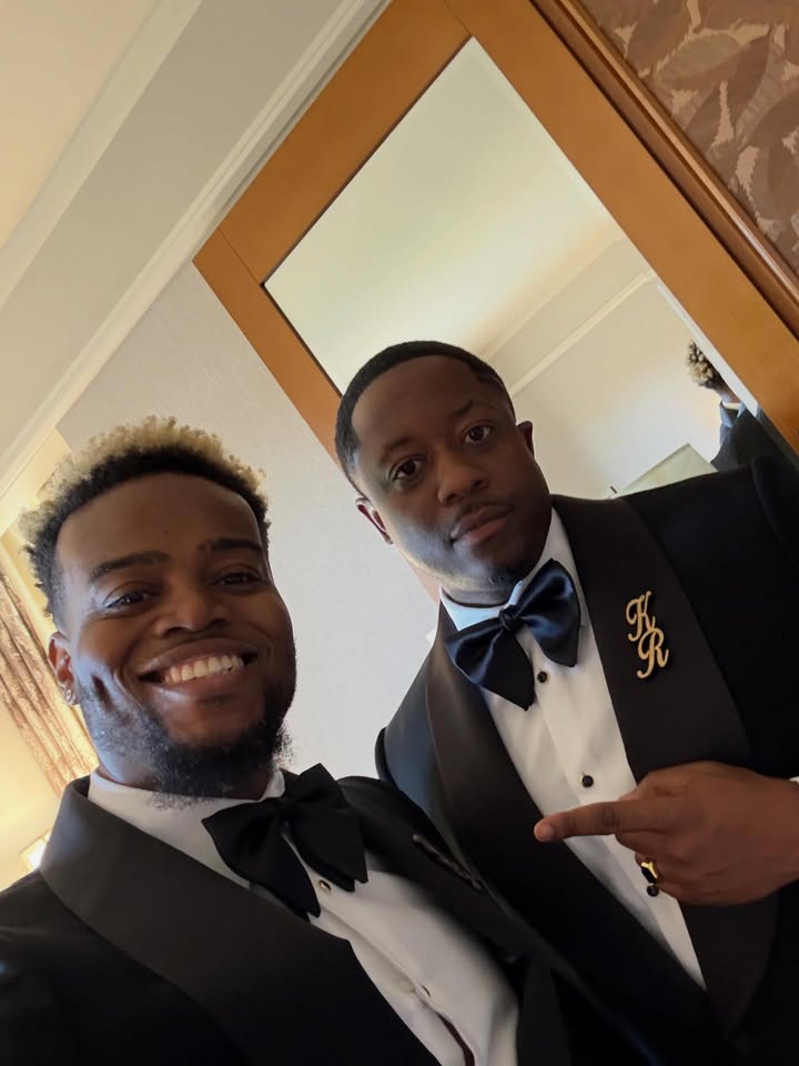 May be an image of one or more people, bow, bowtie, dinner jacket, blazer and text