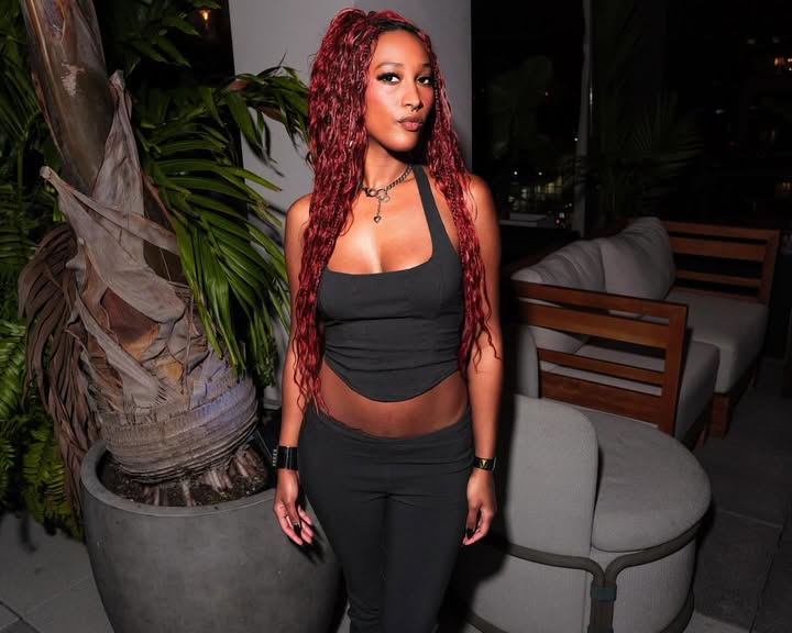 May be an image of one or more people, long hair, makeup and text