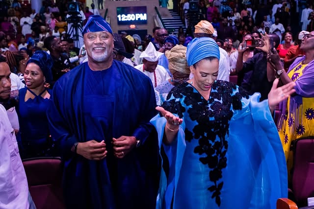 May be an image of one or more people, dais and text