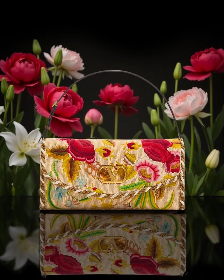 May be an image of purse, clutch and text