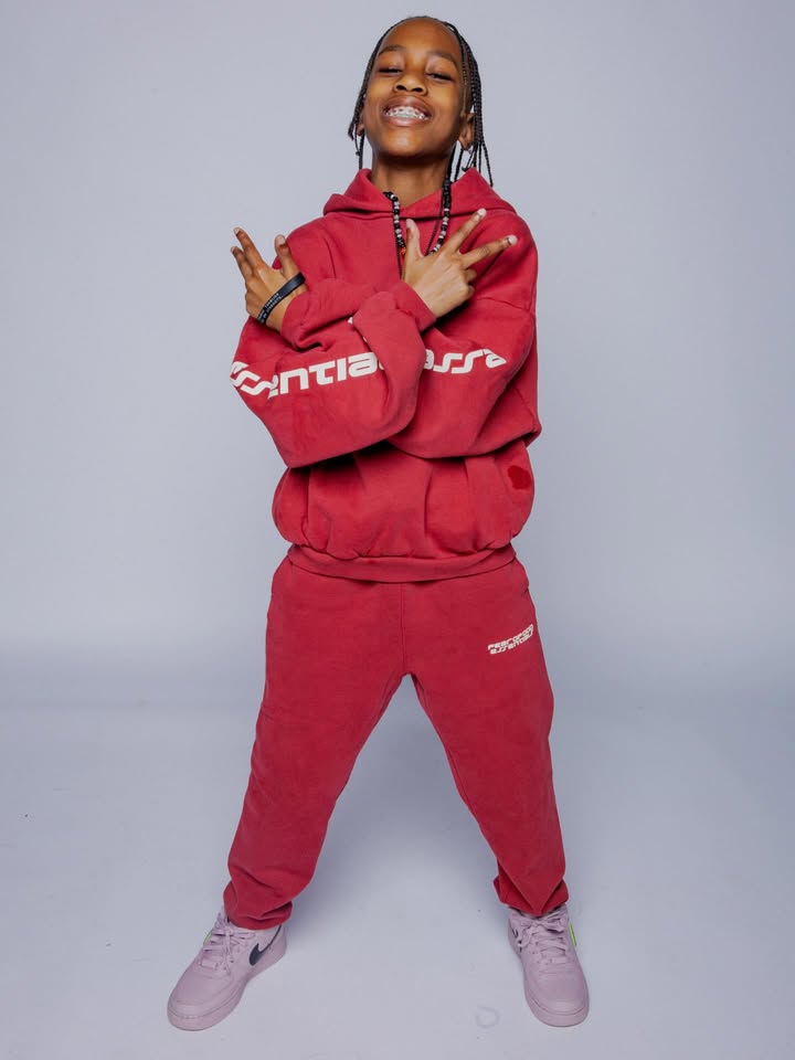 May be an image of activewear, sportswear, fleece, sweatpants, sweatsuit, sweatshirt and text