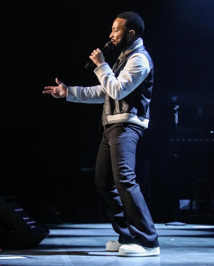 May be an image of microphone, concert and text