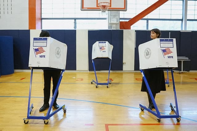 May be an image of text that says 'VOTE VOTE VOTE'