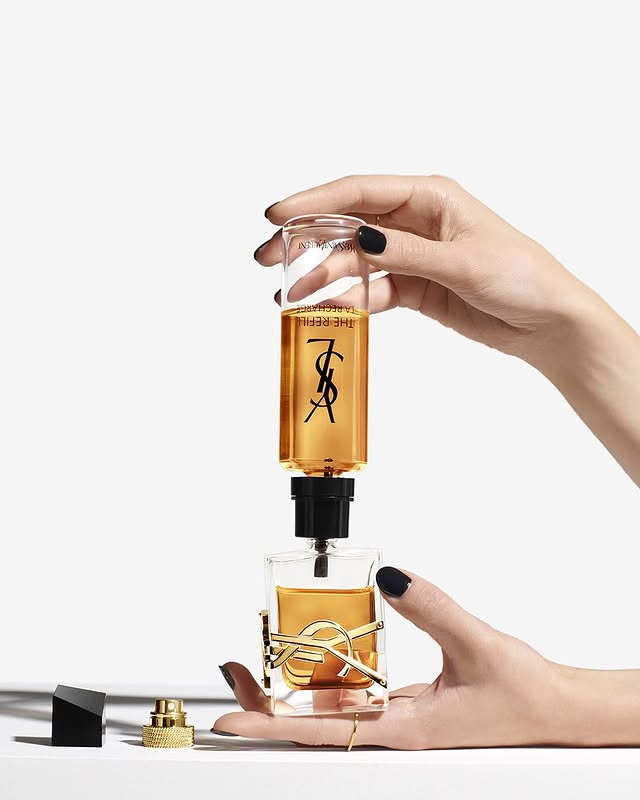 May be an image of fragrance, cosmetics, bottle, thimble, perfume, hand cream and text