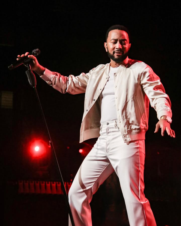 May be an image of microphone, concert and text