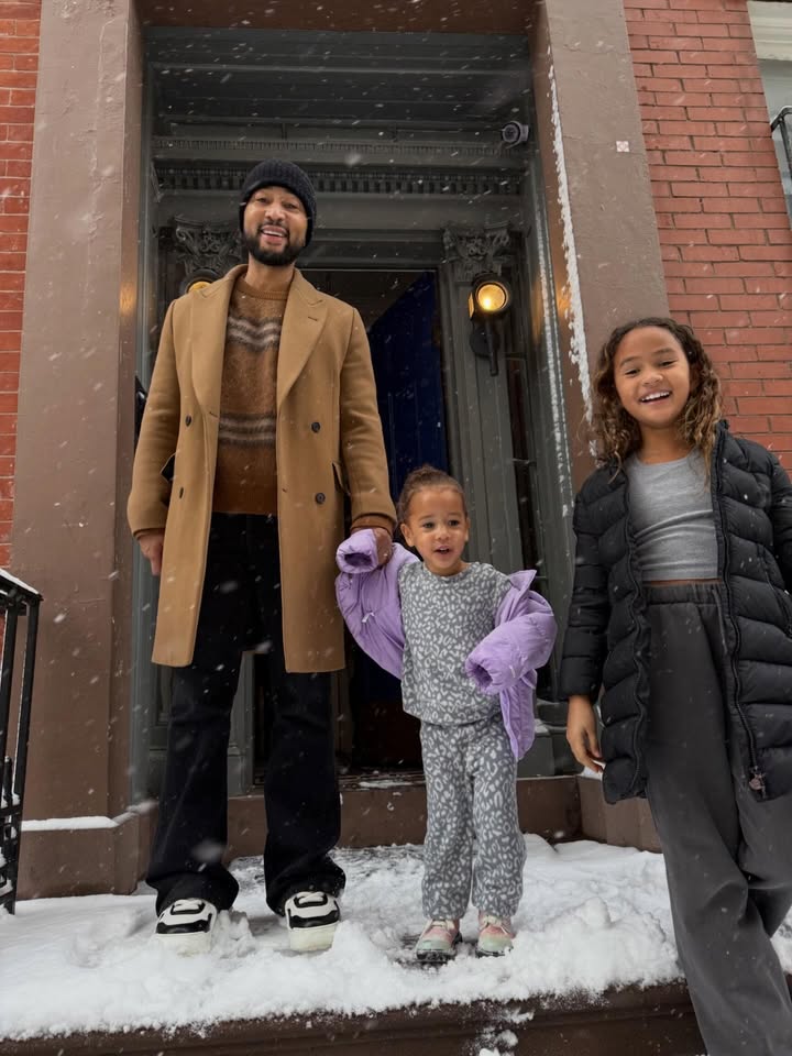 May be an image of child, standing, duffle coat, overcoat, goosedown coat, fur coat, fleece, snowsuit, snow and text