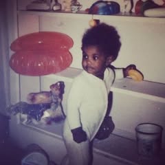 May be an image of baby, standing, diaper and text