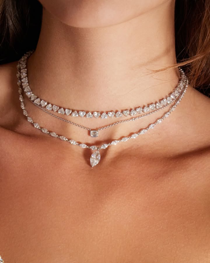 May be an image of jewelry, choker and text