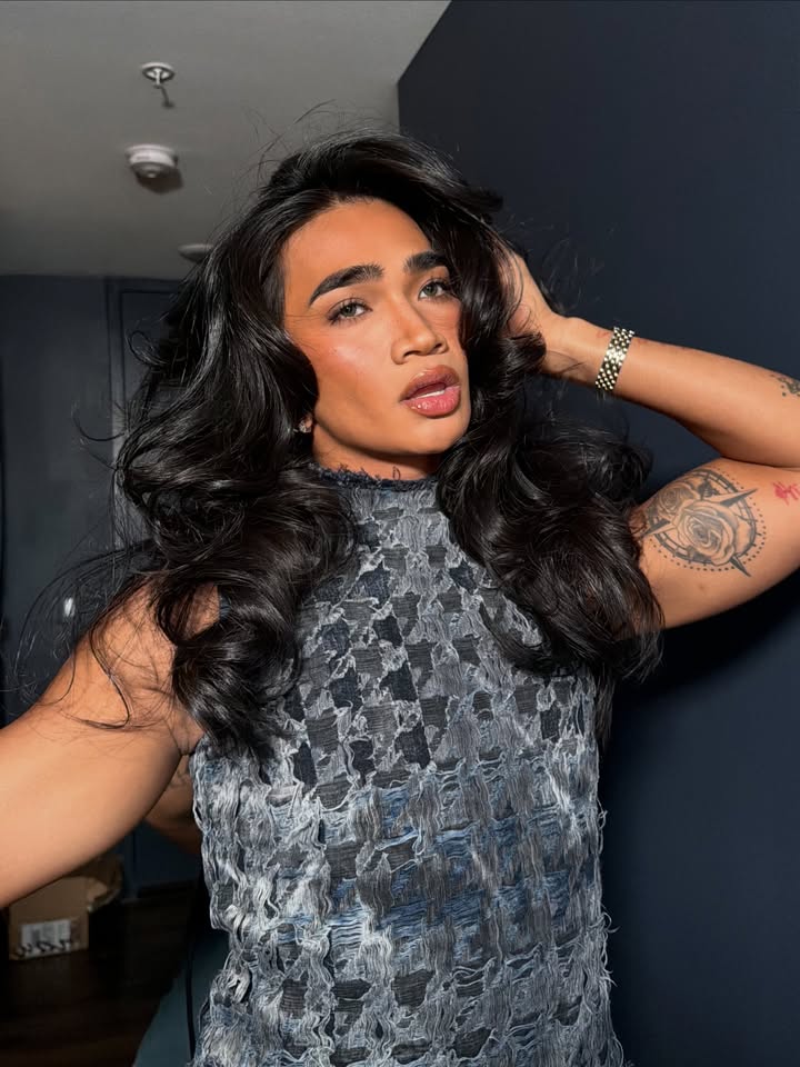 May be an image of one or more people, eyeliner, makeup, hair, dress and text