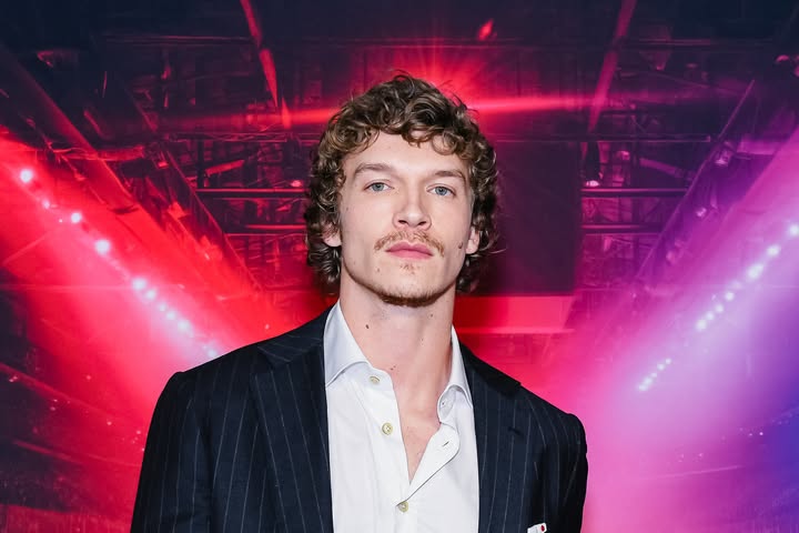 May be an image of one or more people, poster, bolo tie and text