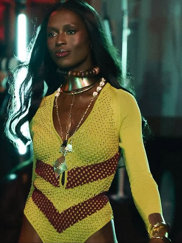 May be an image of one or more people, fishnet stockings and costume