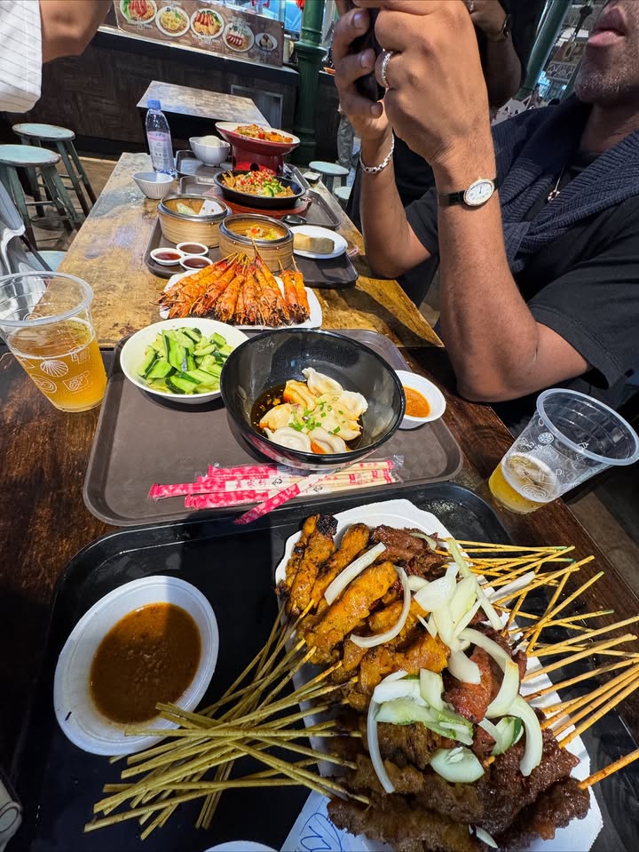 May be an image of sushi, ramen, chow mein, skewer and text