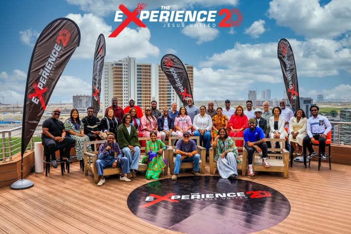 May be an image of ‎one or more people, banner, outdoors and ‎text that says '‎E PERIENCE JESUSUNITED PERIENCE 2 THE JESUS UNITED ED 20 PERIENCE E RIENCE UN س I H Ia 2 ទ PERIENCE 20‎'‎‎