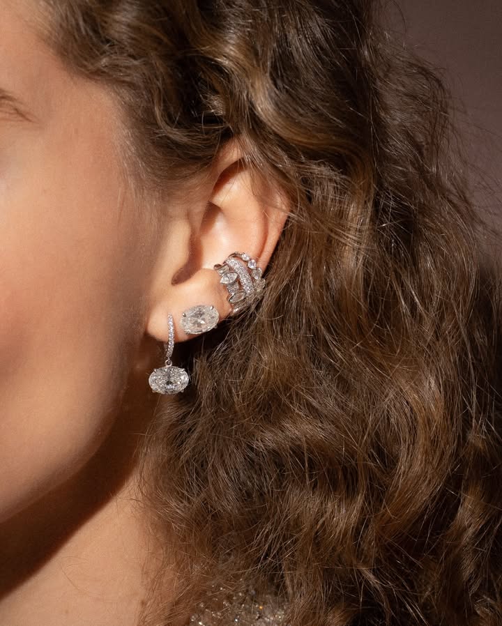 May be an image of jewelry and text