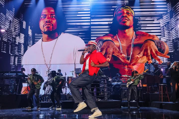 May be an image of microphone, concert and text