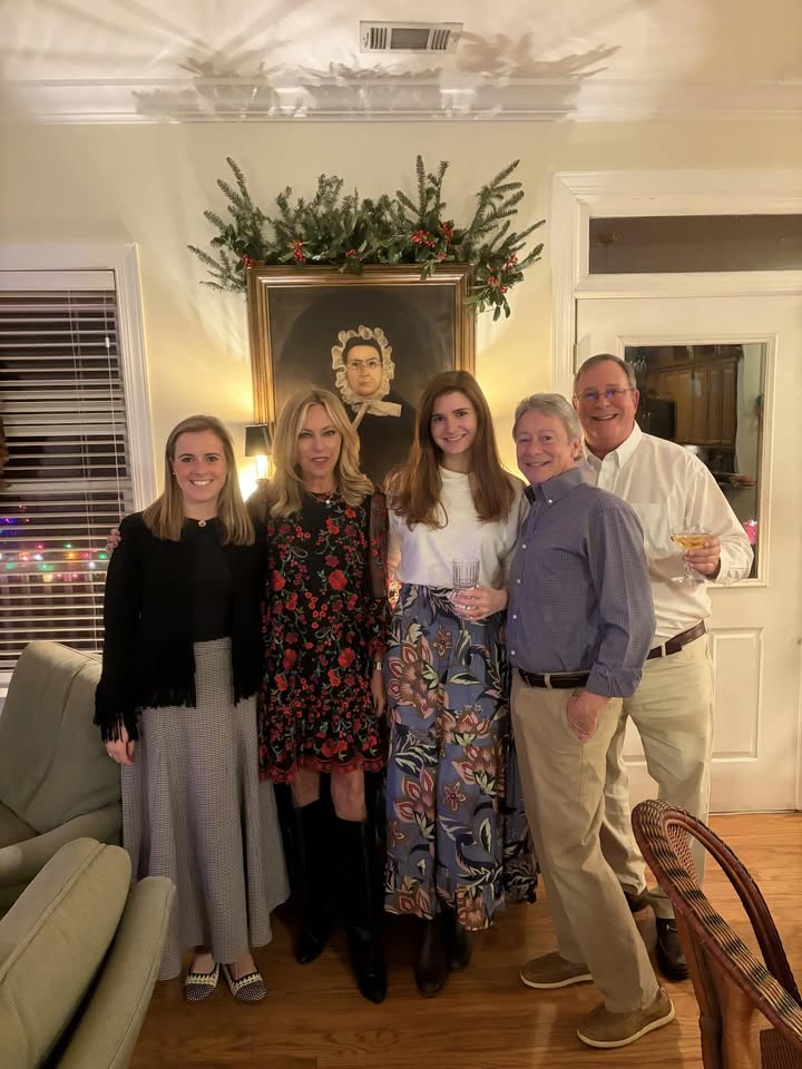 May be an image of standing, christmas tree and text