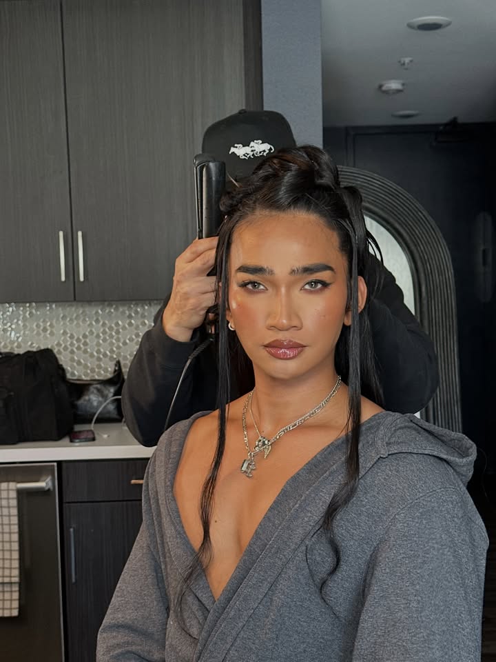 May be an image of one or more people, braids, makeup, sleepwear, robe, bath robe, drawstring and text