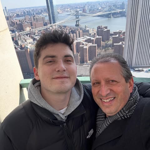 May be a selfie of skyscraper and text