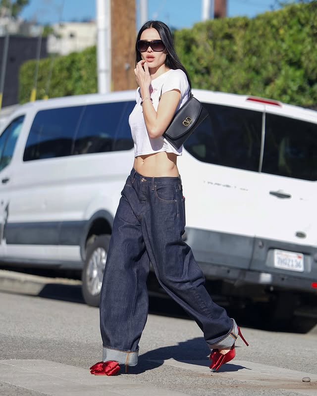 May be an image of one or more people, makeup and text