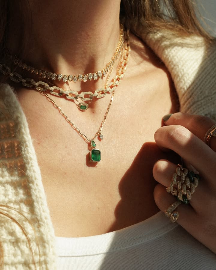 May be an image of jewelry and text