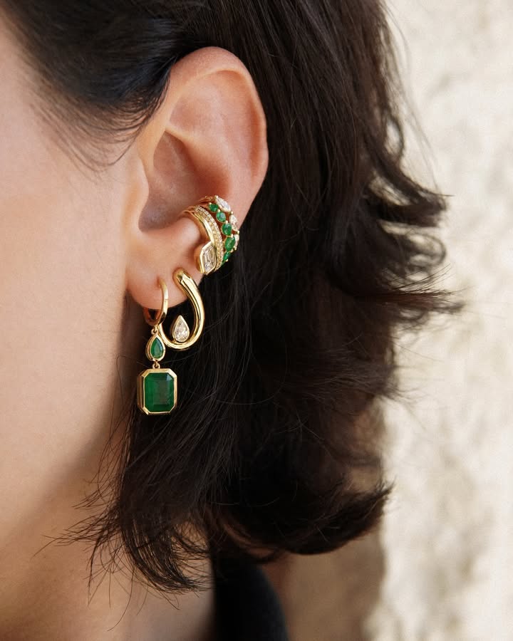 May be an image of jewelry and text