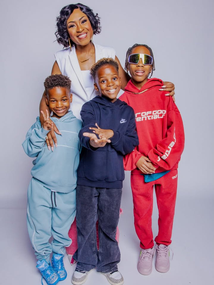 May be an image of baby, smiling, sweatsuit, fleece and text