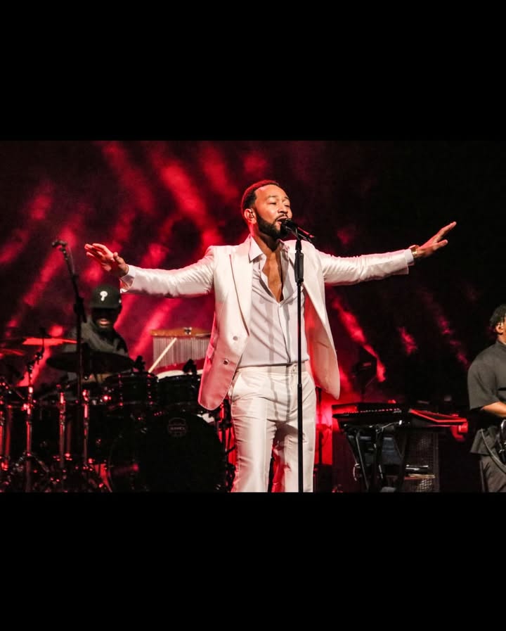 May be an image of microphone, concert and text