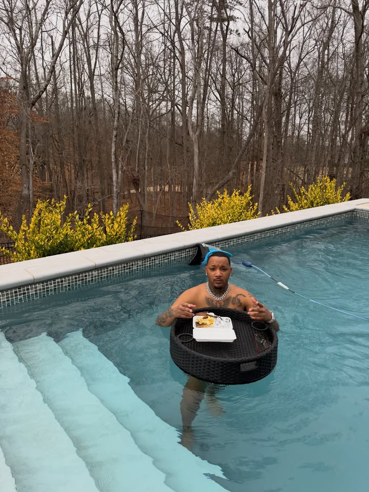 May be an image of swimming, raft, pool and text