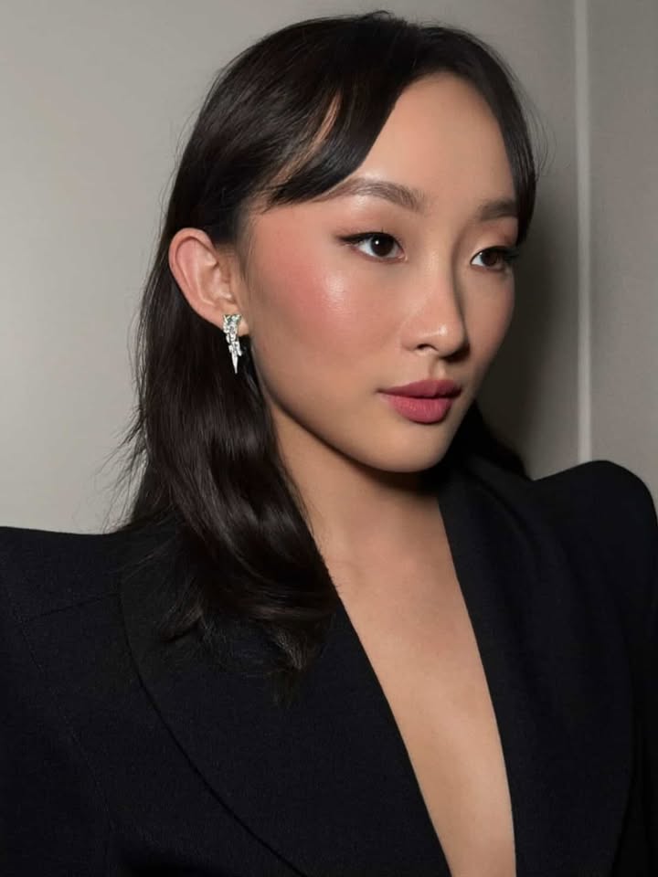 May be a closeup of one or more people, hair, makeup, jewelry and text