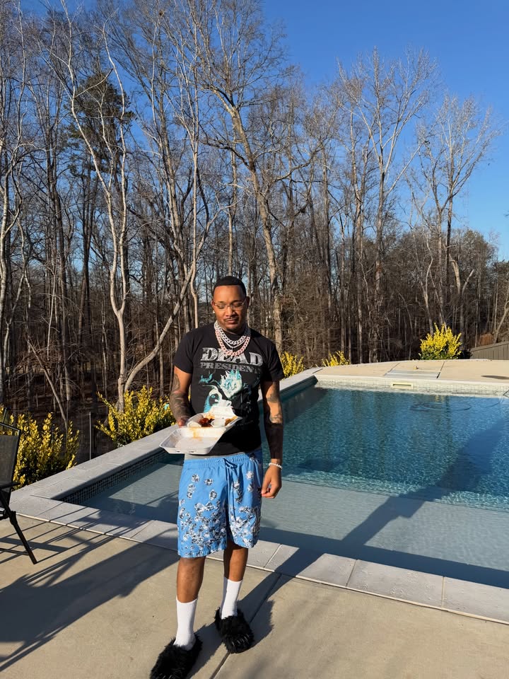 May be an image of standing, pool and text