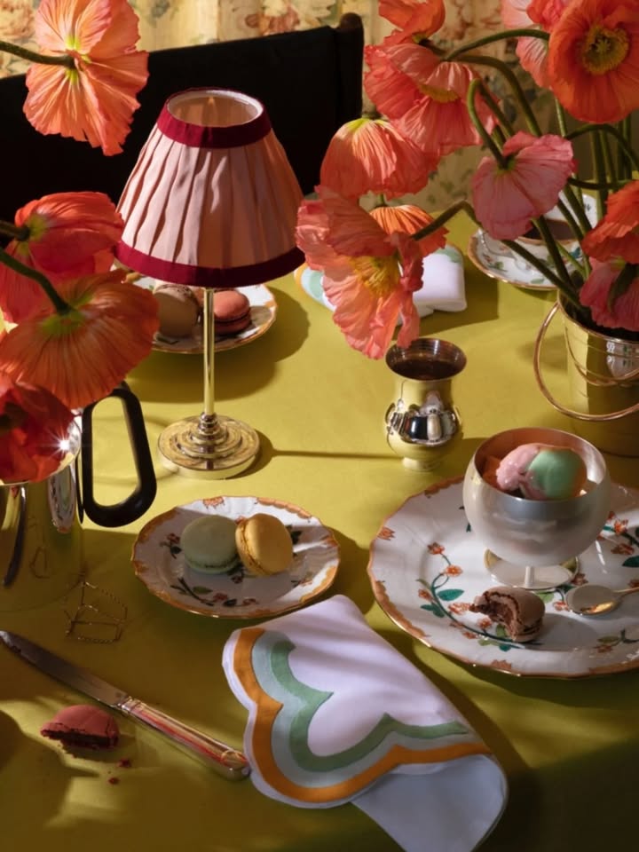May be an image of napkin ring, lamp shade, tablecloth, teacup, chinaware and text