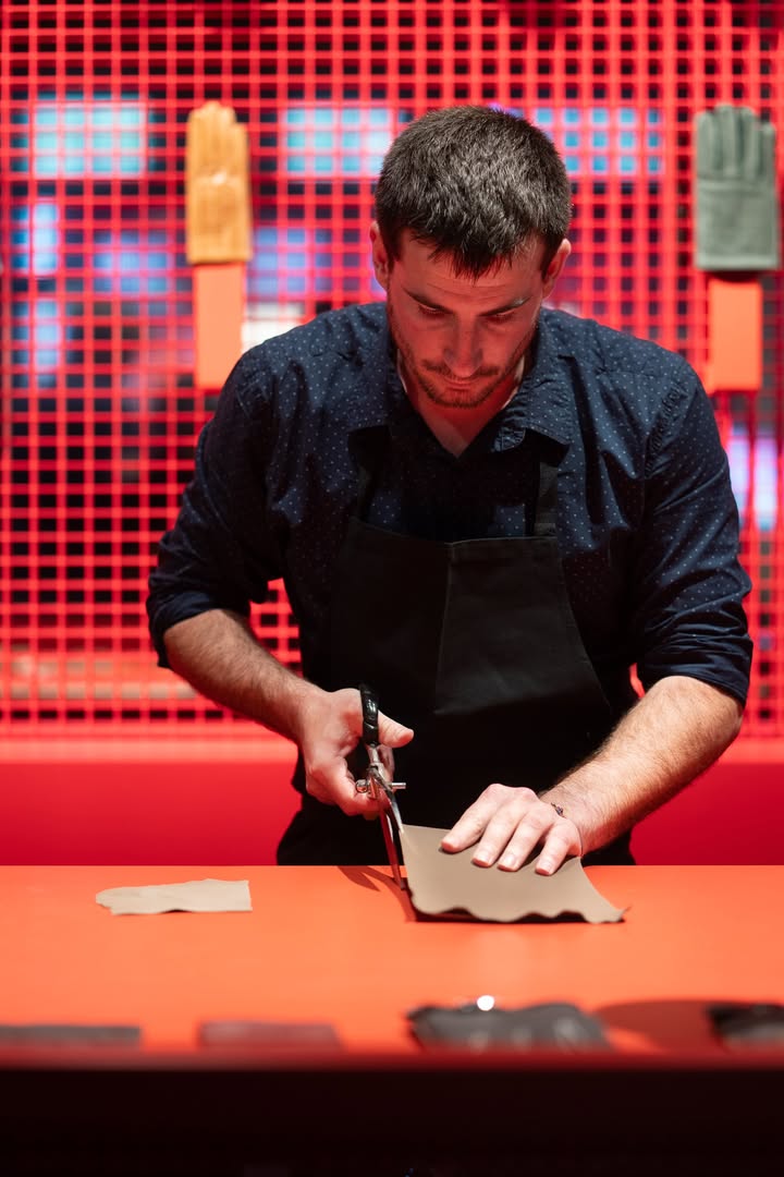 May be an image of knife, apron and text