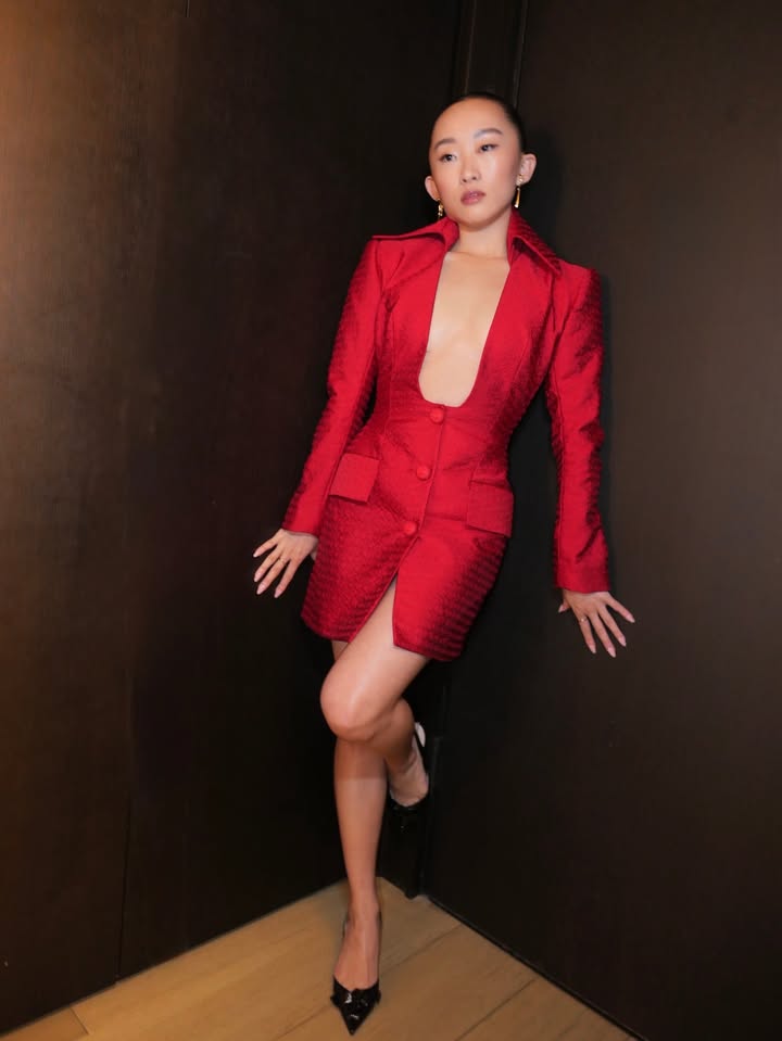 May be an image of one or more people, makeup, blazer and text