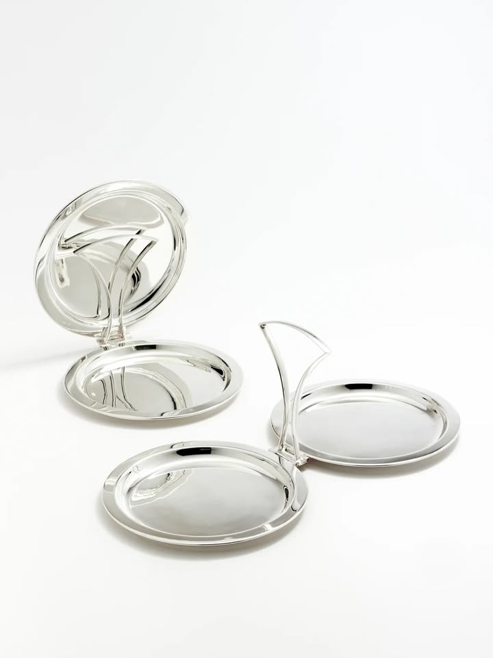 May be an image of ring, napkin ring, paper weight, belt buckle and text